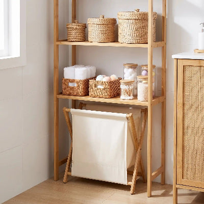 Panier à linge pliable sous étagère salle de bain
